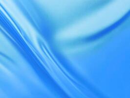 Vibrant Blue Wavy Fabric Texture Background - Abstract Smooth Silk or Satin Cloth with Dynamic Folds Design photo