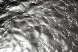 Liquid Silver Metal Texture Background - Abstract Wavy Molten Metallic Surface with Textured Ripples Design photo