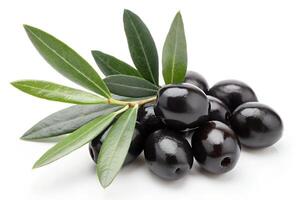 Fresh black olives with green leaves isolated on white background photo