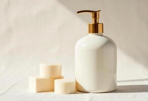 White ceramic soap dispenser with golden pump, accompanied by a stack of solid soaps in a minimalist, clean, and well-lit environment photo