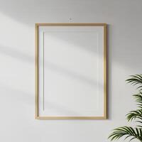 mock up of plain white frame hanging on a white wall photo