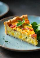 A slice of quiche with bacon and corn on a blue plate, garnished with parsley and arugula, in a dark background photo