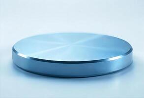 A shiny metallic blue cylinder on a white surface, the cylinder has a smooth, reflective surface, the background is plain white photo