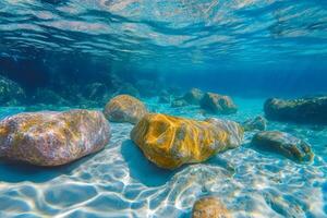 Stones in sea under water. photo