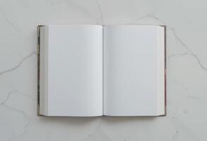 Blank white book mockup against white background. photo