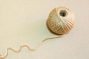 Texture of brown natural rustic hemp cord in roll photo