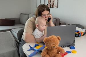 A busy parent balancing work demands with effective childcare management at home photo
