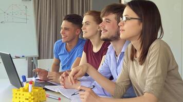 Dynamic creative team engaged in a presentation video
