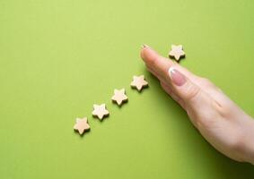 Deprivation of one of five stars. Decreasing the popularity rating. Declining trust and customer satisfaction. Negative feedback. Rebuild reputation to regain consumer confidence. photo