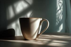 Morning Coffee Cup on a Table With Sunlight Casting Shadows in a Cozy Room photo
