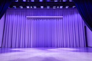 Fabric wavy background with space for copying. An element for your design. A podium stage with trendy purple lighting. photo