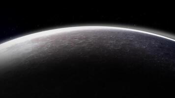 Planet surface with craters and thin atmosphere emerging from the shadow video