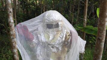 An African beekeeper shows the freshly extracted hive where honey is collected video