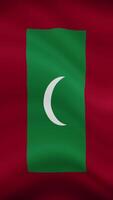 Maldives Waving Flag in Vertical Orientation. Realistic Flag Animation. Seamless Loop Background. video