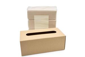 Empty brown tissue paper box isolated on white background with brown TISSUE PAPER pack. photo