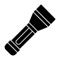 a black and white silhouette of a flashlight vector