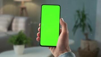 Smartphone with green screen isolated on white Smartphone with green screen isolated animation on white background. 4K animation with mobile phone mockup and motion zoom effect. video