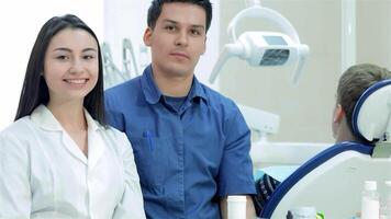 Dedicated dentists ready for a new working day in the dental office video