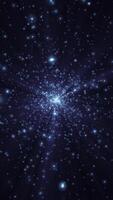 abstrato partícula animação com cintilante brilhante azul partículas e cintilante luz raios. brilhando estrelas dentro espaço efeito. isto vertical movimento fundo animação é cheio hd e uma desatado laço. video