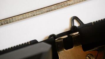 Typing the word Open with an old manual typewriter video