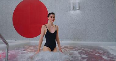 Beautiful Young Woman Taking Warm Bath In SPA, Enjoying Jacuzzi And Pool, Hydrotherapy For Body video
