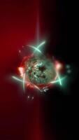 3D illustration of an atom, on a red and black background showing the nucleus with protons and neutrons. video