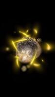 3D illustration of a gold-colored atom showing the nucleus with protons and neutrons. video
