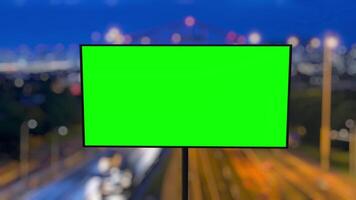 Billboard showing green screen changing background from day to night timelapse video