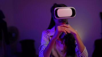 A woman wearing a virtual reality headset video