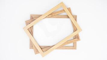 Empty wood photo frame isolated on white background