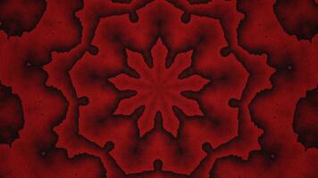 Red and black abstract design with center flower. Kaleidoscope VJ loop video