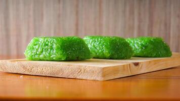 Traditional Indonesian snack made from glutinous rice called wajik isolated on white background studio photo