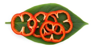 Red capsicum vegetable placed on white background with shadow for seasonal recipe concepts photo