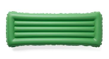 green Inflatable float lounge bed isolated on white for pool lounging, relaxing in the sun and enjoying summer holidays photo