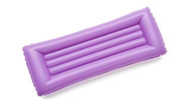 purple Large inflatable pool float with bright colors isolated for summer celebrations, water sports and tropical getaways photo