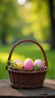 Easter Egg hunt. A woven basket holds vibrant pastel eggs nestled in greenery, highlighting a joyful spring atmosphere in a sunny park. Social media story, greeting card. photo