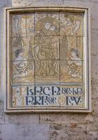 Decorative and intricate element, part of the Valencia Cathedral in Spain, showcasing religious artwork. photo