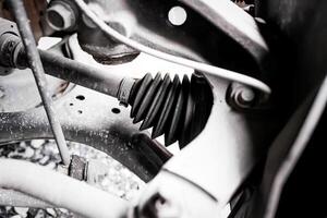 Drive shaft boot, Close up a rubber boot of front drive shaft photo