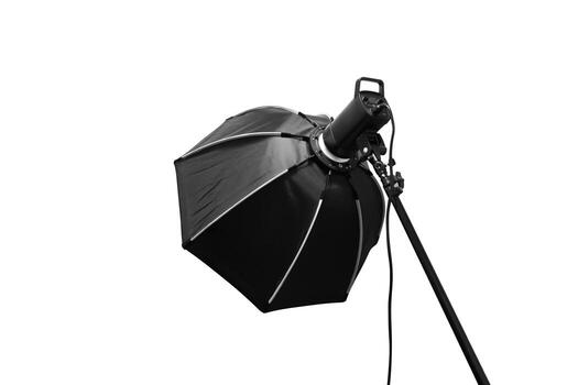 Studio softbox light isolated on white background, Photography lighting equipment with a softbox modifier on a stand. photo