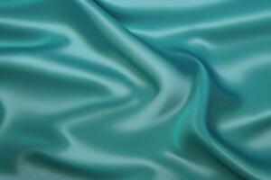 Background Texture of Teal Silk Fabric for Background Abstract Draped Background photo