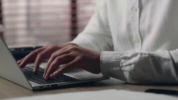 Focused Caucasian male corporate leader employer man broker guy hands typing keyboard computer manager business agent working network laptop in office worker programming businessman company job online video