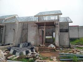 Unfinished House Structure with Exposed Roof Frame photo