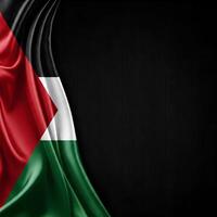 Palestine flag with black, white, and green horizontal stripes and a red triangle on the left side. photo