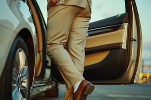 the businessman wants to get into a luxury car photo
