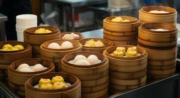 Assortment of delectable dim sum in bamboo steamer baskets, culinary delight photo