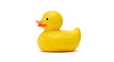 Adorable yellow rubber duck toy on a pristine white background close-up photo