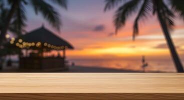 Tropical beach bar at sunset with wooden table for product showcase photo