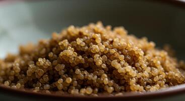 A macro image of cooked quinoa, a nutritious and healthy grain, ready to be eaten. photo