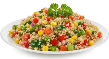 A colorful and healthy quinoa salad with mixed vegetables on a white plate. photo