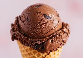 A refreshing scoop of chocolate chip ice cream in a crispy waffle cone photo